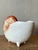 This charming vintage ceramic cachepot is meticulously molded and glazed in the shape of a nautilus shell, embodying the...
