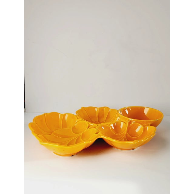 Mid Century Modern USA Pottery glazed ceramic bright orange chip & Dip dish with a beautiful leaf design. The dish...