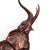 The Bronze Glass Top Elephant Dining Table is a stylish and versatile piece perfect for both indoor and outdoor dining....