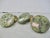 Set of three Votive candle spikes mounted on spotted green jasper stands. Charming little crowned lizards rest in the...