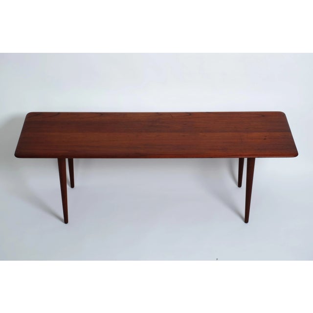 Mid-century modern coffee table designed in the 1960s by Peter Hvidt for France and Son, Denmark. This coffee table has a...