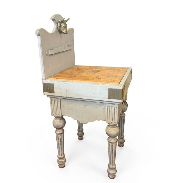 Early 20th Century French Provincial Butcher's Block with Brass Details An early 20th-century French Provincial butcher's...
