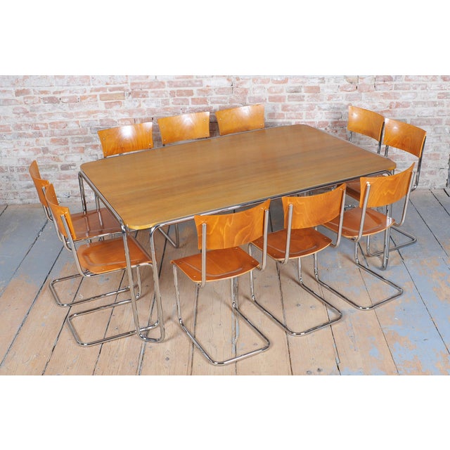 This dining table is a prime example of 1930s czechoslovak functionalist design in the bauhaus style. Manufactured by the...
