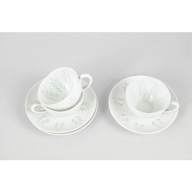 Friedl Holzer-Kjellberg for Arabia Set of three mocha cups with saucers, 1970s. Elegant set consisting of three mocha cups...