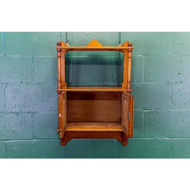 Exceptional Quality Regency Hanging Cabinet/Cupboard in Mahogany with Plum Pudding Doors Two useful shelves and brass...