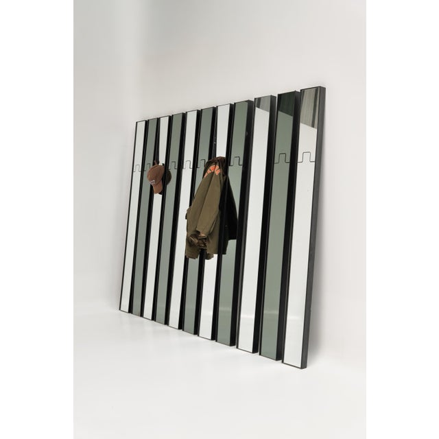Set of nine Gronda mirrors (two sold) designed by Luciano Bertoncini and produced by Elco in the 1970s. Made of plastic,...