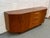 A true icon of British mid-century design, this teak sideboard from the celebrated “Fresco” range by G Plan brings...