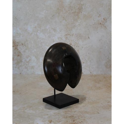 Tutsi bangles are hand-carved using local indigenous wood and they are designed with metal such as copper inlays. These...