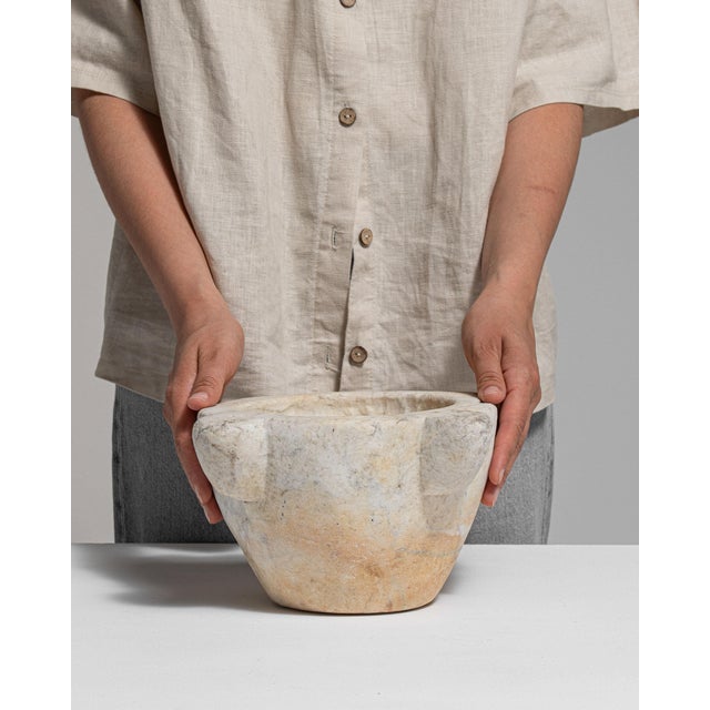 This 19th century serving piece from France is finished in antique white, worked in marble. Its form follows honest, well-...