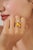 This bear cocktail ring featuring a 7.24 carat cabochon citrine, set in 18K yellow gold. The center stone measuring 12 mm,...