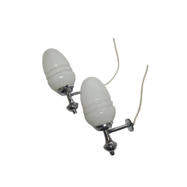 A pair of sconces from the 70s. They are preserved in good condition. European Plug (up to 250V).The wiring of this item...