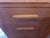A nice Art Deco Oak Coat Rack. Six hooks , mirror , cabinet and a drawer. Nice unusual piece. Made by Heals of London.