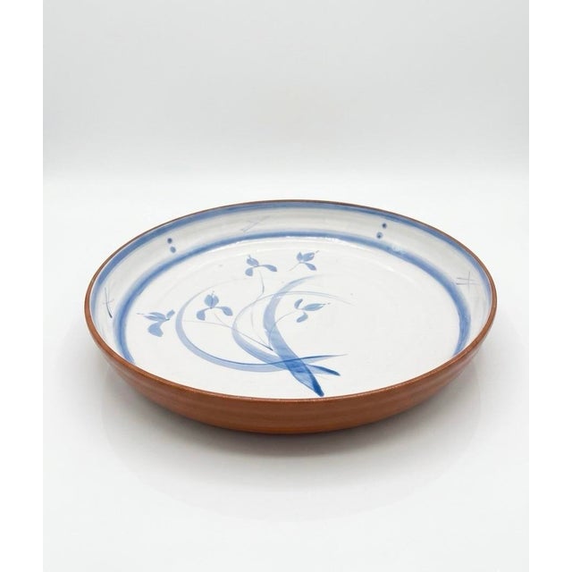 This elegant vintage ceramic bowl features a timeless Mediterranean aesthetic, combining rustic terracotta craftsmanship...