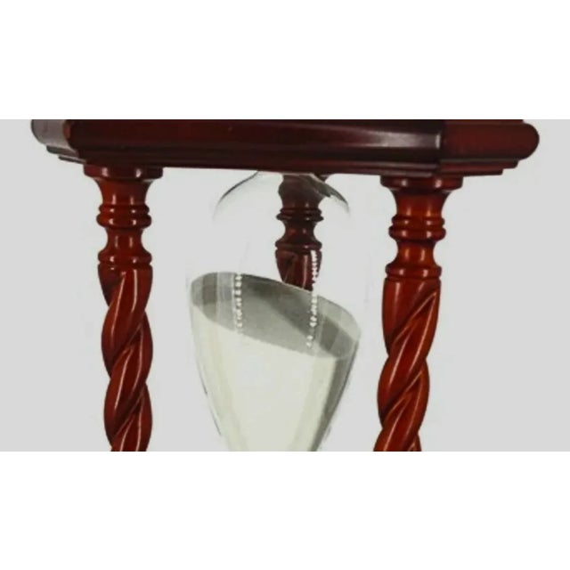 A touch of Olde World decor from the former Bombay Company makes this hand blown hourglass an elegant accent for any room....