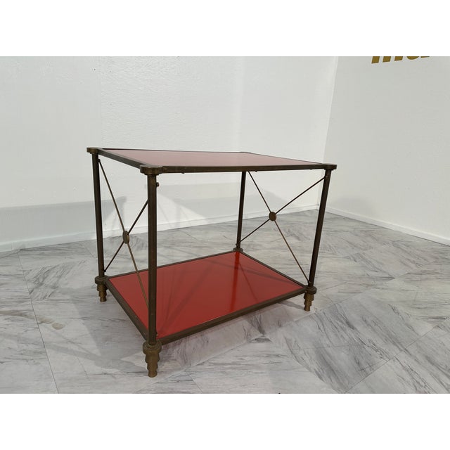 The Vintage Italian Brass Side Table from the 1980s boasts a sleek and sophisticated design, epitomizing the glamour of...