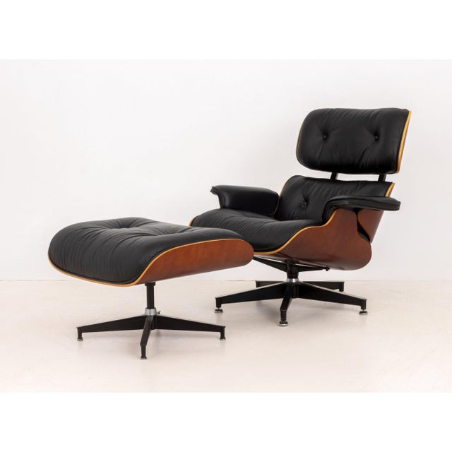 Charles and Ray Eames for Herman Miller Lounge Chair and Ottoman, model 670 and model 671, black leather upholstery and...