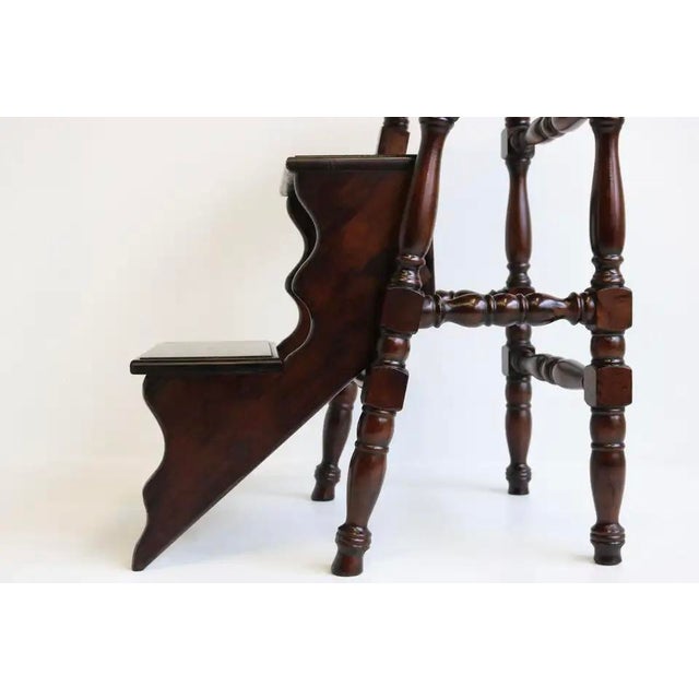 Lovely Antique English Victorian Library stairs made from carved walnut with dark finish during the 1920s in England. This...