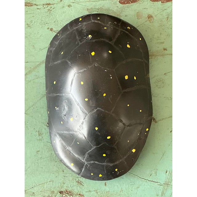 This vintage Italian scagliola turtle shell is a masterfully executed decorative object, channeling the timeless appeal of...