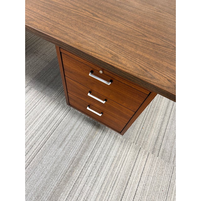 -MCM Executive Desk -MANUFACTURE: Unknown -IN THE STYLE OF: Mid-Century Modern -DATE OF MANUFACTURE: 1960's -MATERIALS:...