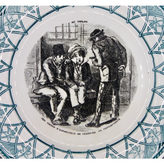 A superb French Sarreguemines Decorative Plate, circa 1900. A lovely teal blue geometric border with central depiction “Au...