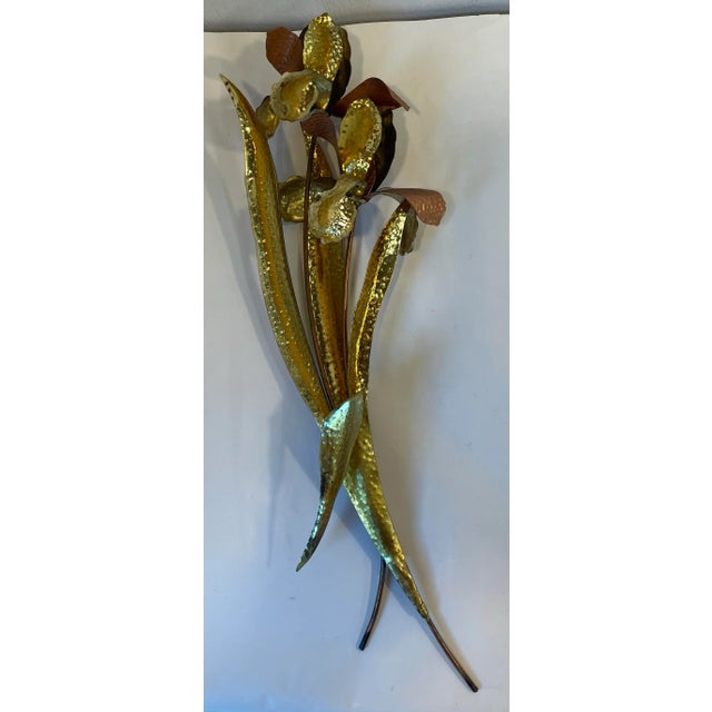 Nice vintage metal wall sculpture of a flowers.