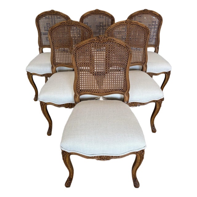Set of Six Carved Wood Cane Back Dining Chairs With Upholstered Seats For Sale
