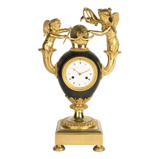 Empire Clock with Cupid Sharpening the Arrow of Love attributed to Claude Galle, 1805 For Sale