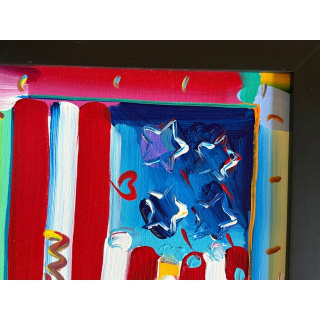 Original Peter Max “Flag with a Heart” acrylic painting on canvas, featuring one of the celebrated American Pop artist’s...