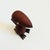 A mid century turned wood figurine in the shape of a Wood Pecker. Adorable stylized features. Made in Japan by Senshukai...