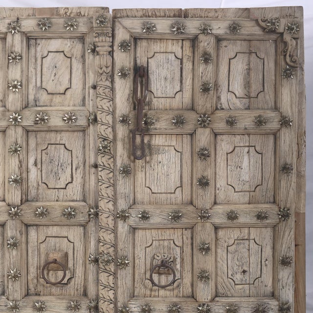 This Antique Indian Carved Teakwood Door, c. 1880–1900, has been carefully bleached to reveal the intricate carvings while...