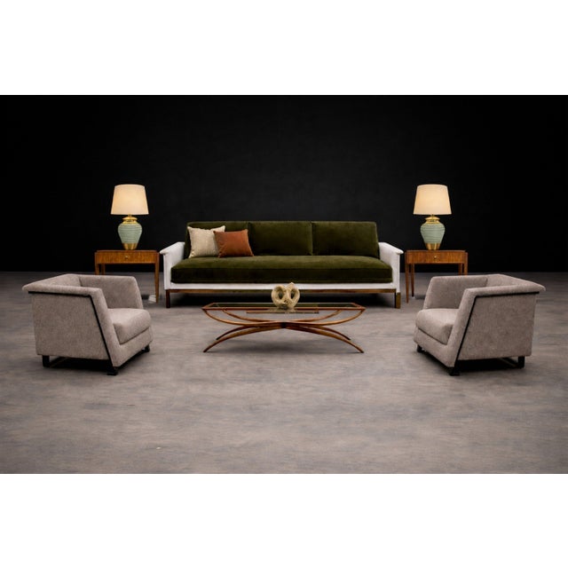 A rare and architecturally disciplined pair of armchairs by Geraldo de Barros, executed in blackened steel and newly...