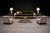A rare and architecturally disciplined pair of armchairs by Geraldo de Barros, executed in blackened steel and newly...