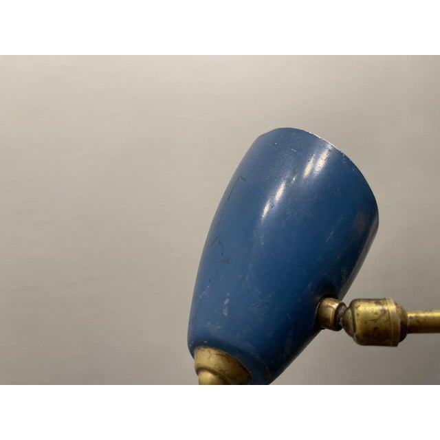 Multicolored aluminum brass light pendant 1950’s red yellow blue metal shades yellow shade has some paint missing height...