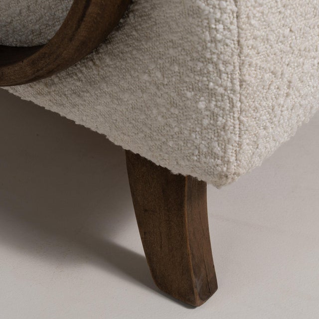 Here is a pair of armchairs, its cream upholstery, dark wood bentwood arms the first thing to catch the eye. The piece...