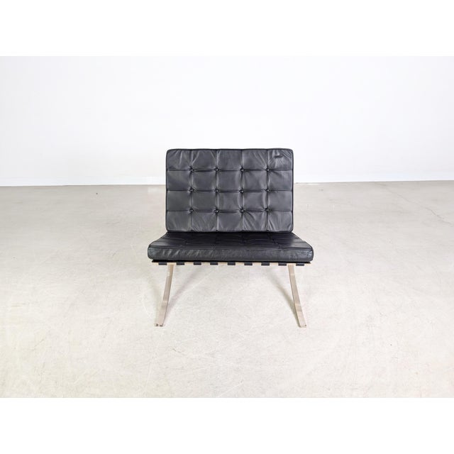 We are offering one of only two beautiful barcelona armchairs by knoll international from the 1970s for sale. The...