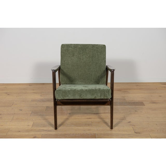 The armchair was produced by the Polish company Swarzędzka Furniture Factory in 60 s. The armchair have new cushions,...