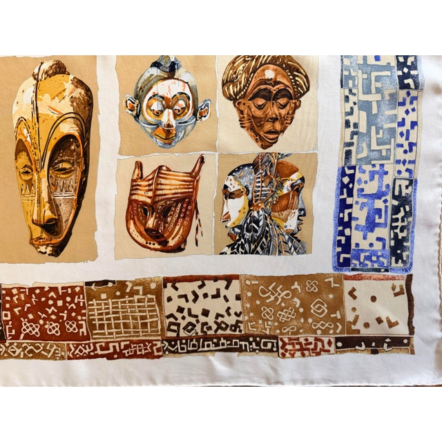 Hermes Persona silk scarf designed in 1997 by Loïc Dubigeon. This scarf celebrates African masks. Collections of tribal...