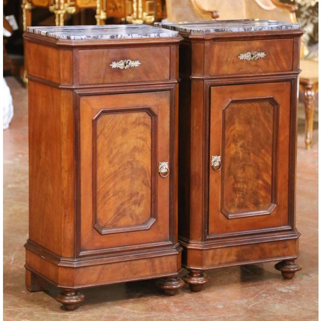 Elegant in proportion and richly figured, this pair of antique bedside tables combines practical storage with the...