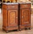 Elegant in proportion and richly figured, this pair of antique bedside tables combines practical storage with the...