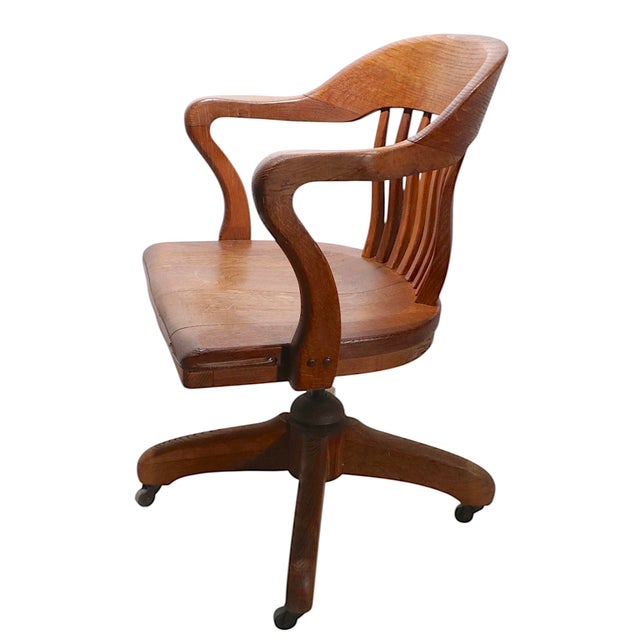 Nice bank of England, Jury style swivel tilt office, desk chair, constructed of solid oak, made by the Marcy-Morris Co....