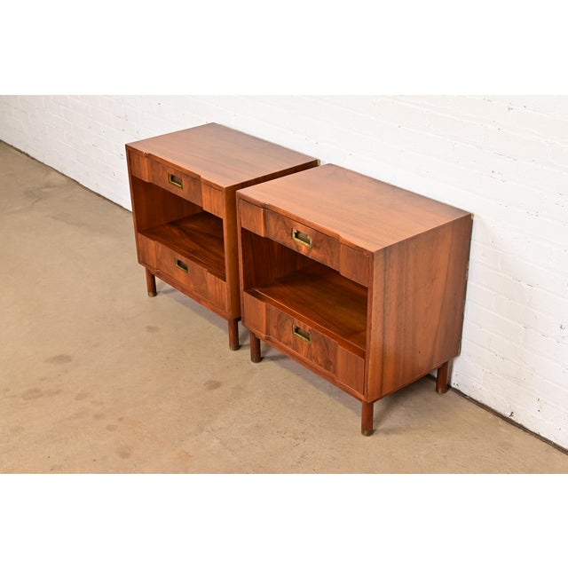 An exceptional pair of mid-century modern Hollywood Regency nightstands By John Widdicomb USA, Circa 1960s Gorgeous carved...