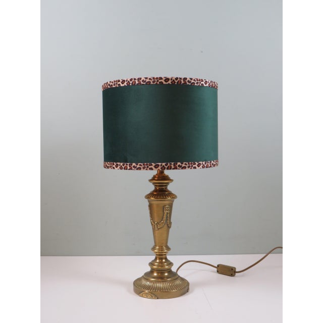 Elegant vintage brass table lamp combined with a bespoke lampshade in deep green velvet. the shade is handcrafted using...