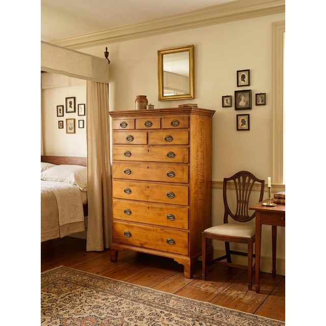 A handsome and unusually configured American Chippendale tall chest of drawers dating to the late 18th century, circa...