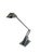 A particularly expressive desk lamp by hillebrand leuchten germany from the 1980s. it is made of polished metal and...
