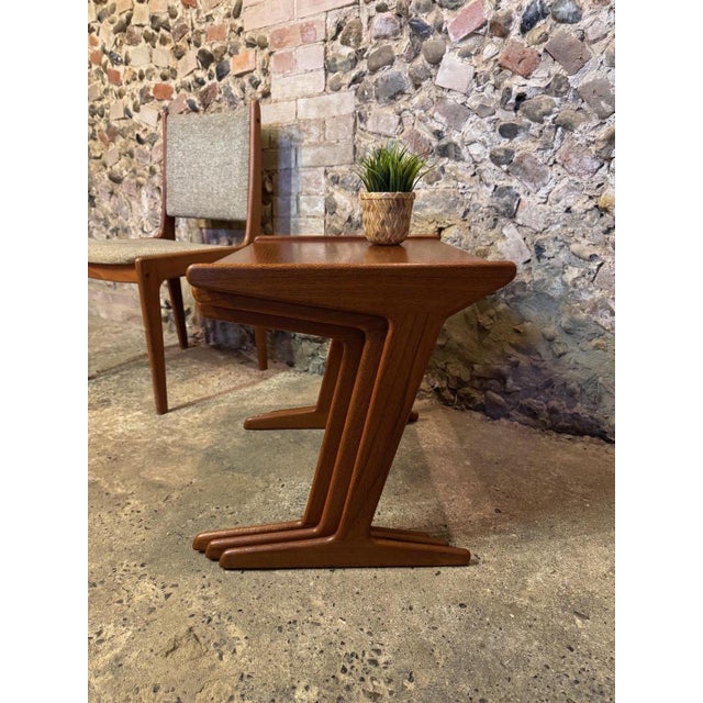 Absolutely stunning (and rare) mid-century nest of tables produced by Modena Kold Møbelfabrik, Denmark. Makers label with...