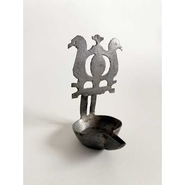 Rare 18th century folk art grease whale fat oil lamp made from carved tin. Measures 6" by 4". Excellent condition for its...