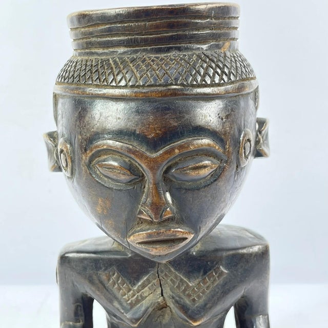 The Kuba people of the Democratic Republic of the Congo are renowned for their intricate figurative carvings, notably seen...