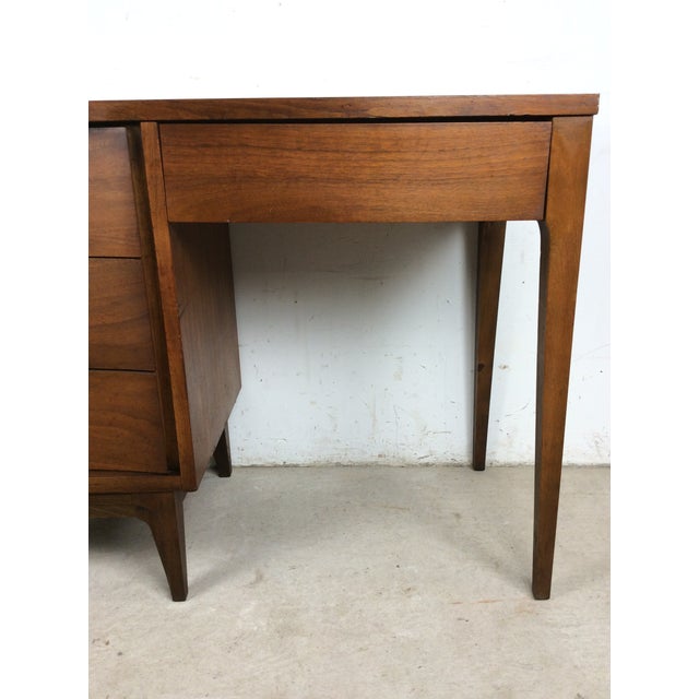 Mid Century Modern Four Drawer Writing Desk With Curved Drawer Fronts and Brass Hardware For Sale - Image 10 of 11