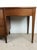 Mid Century Modern Four Drawer Writing Desk With Curved Drawer Fronts and Brass Hardware For Sale - Image 10 of 11