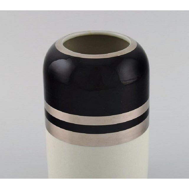 Peter Winquist for Arabia. Modernist vase in glazed ceramics with silver decoration. Finnish design, 1960s. Measures: 18 x...